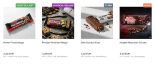 Power Proteinriegel mit Ribbon Meistgekauft, Protein-Proleten-Riegel mit Ribbon Kundenliebling, Diät-Schoko-Fuel mit Ribbon Stark und Muskel-Massaker-Schoko mit Ribbon Hype in der Kategorie-Boxansicht